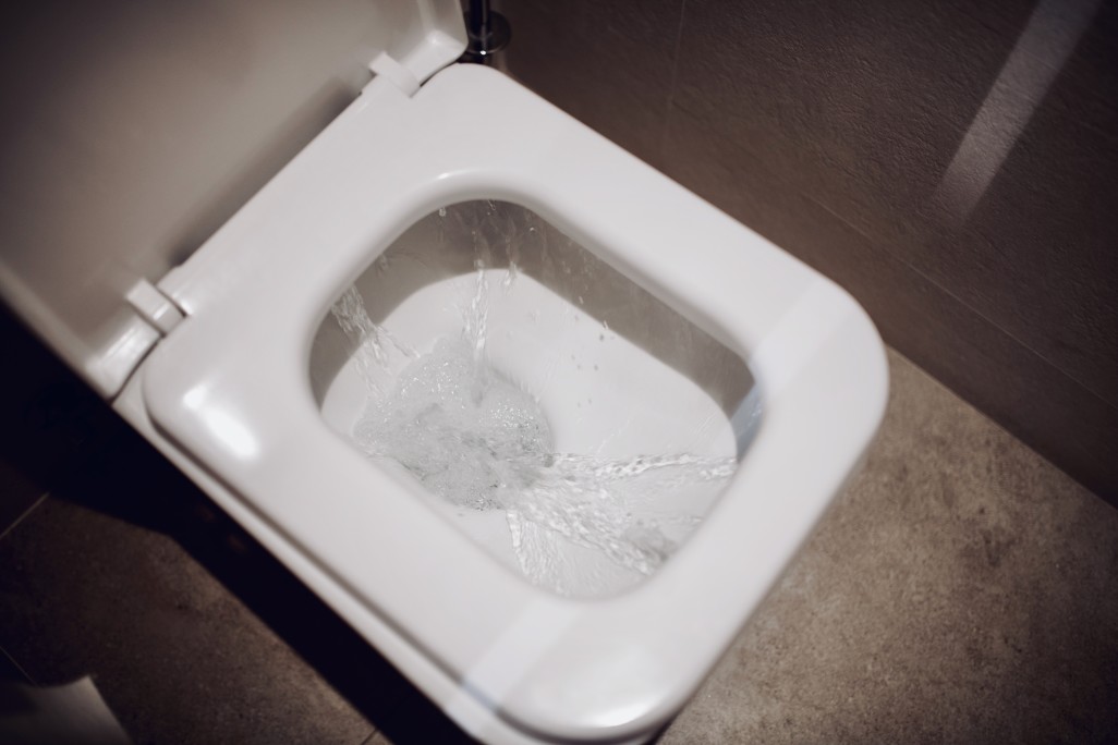 A flushing toilet