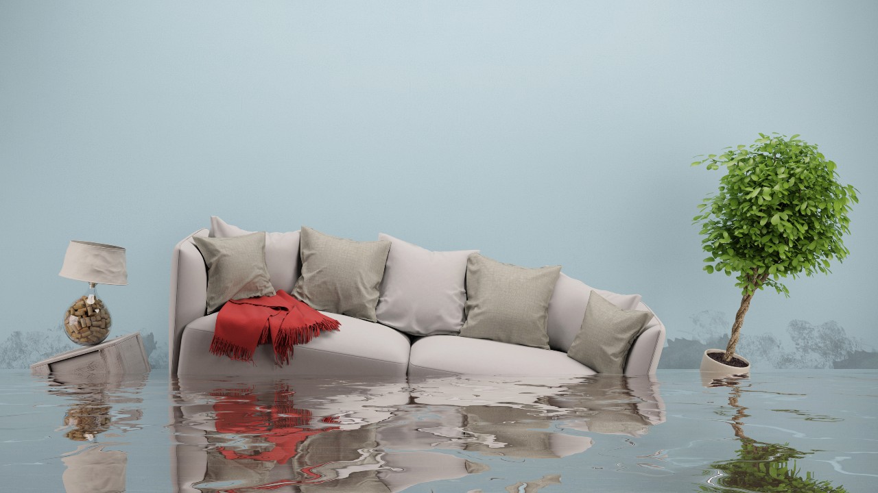 An image of living room furniture underwater from a flood